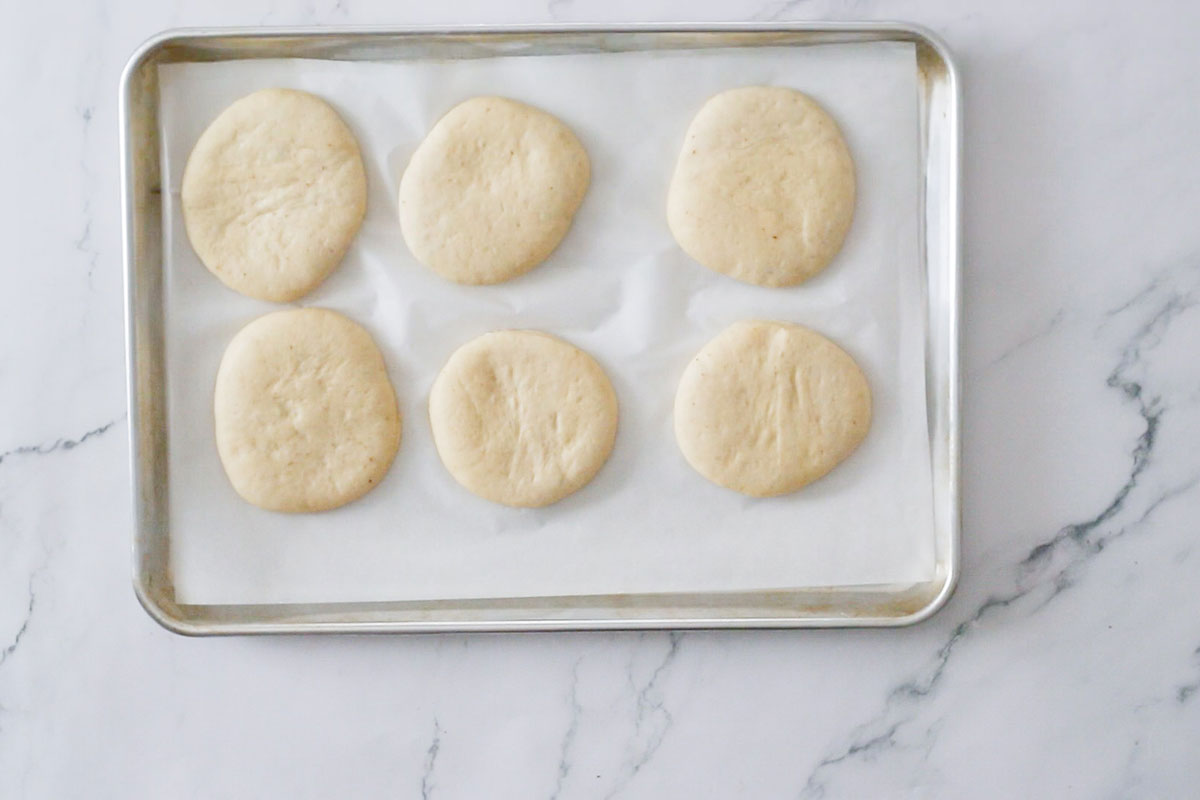 The puffy dough circles after resting.