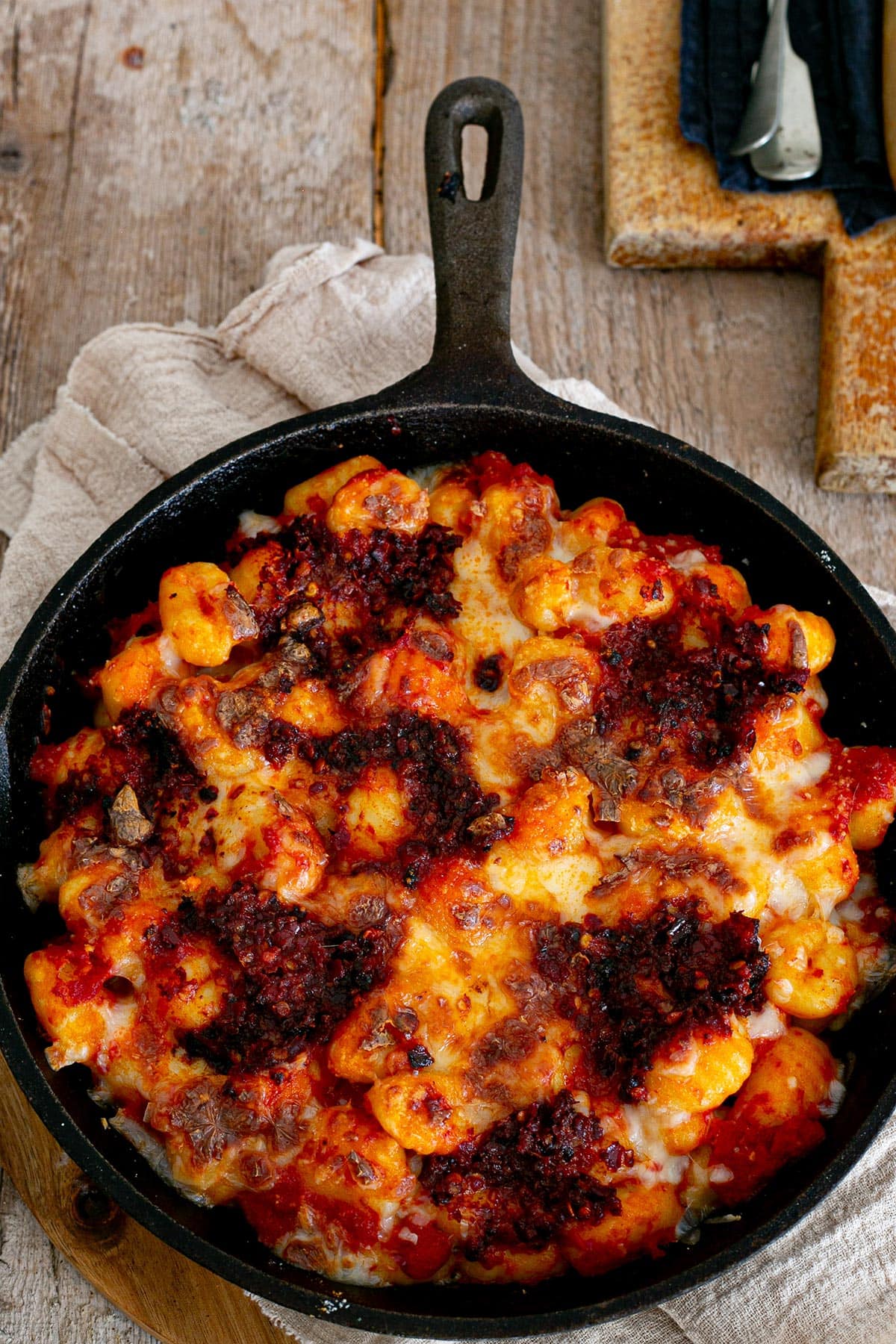 Gnocchi with 'nduja and mozzarella baked in a skillet.
