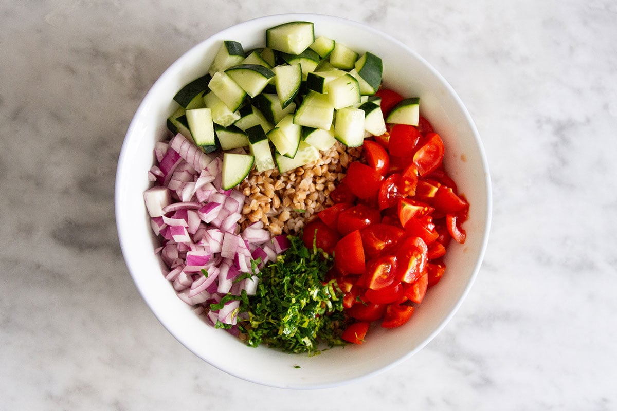 Ingredients for insalata di farro in a bowl.