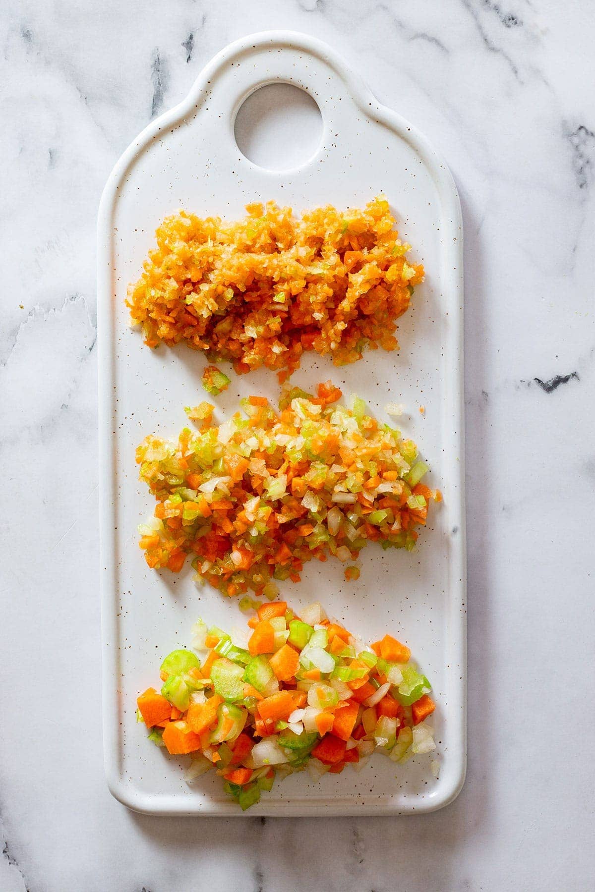 Italian soffritto cut into three ways: Roughly diced, minced, and finely chopped.