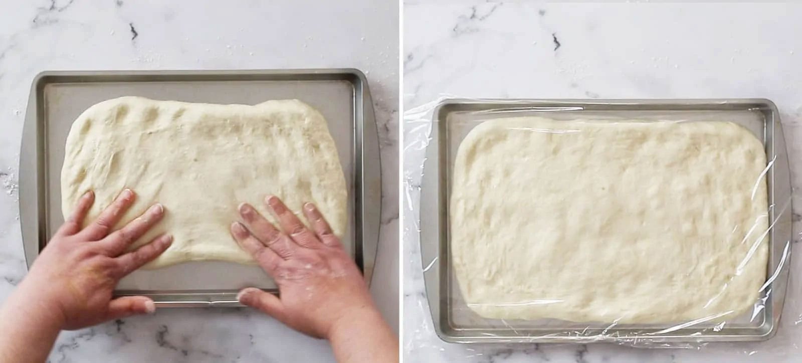 Rolling the dough on a baking sheet using two hands.