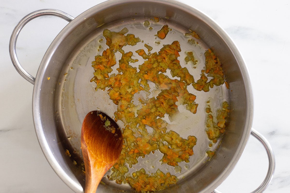 Soffritto cooking in a pot.