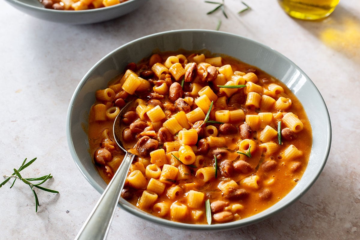 Authentic pasta e fagioli in a bowl with a spoon.