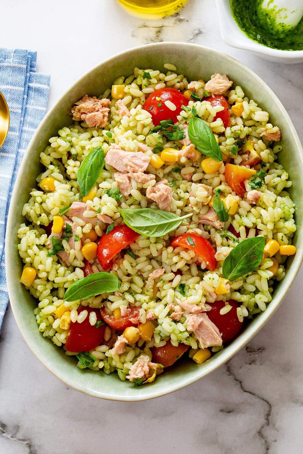 Close-up of pesto rice salad with tuna.