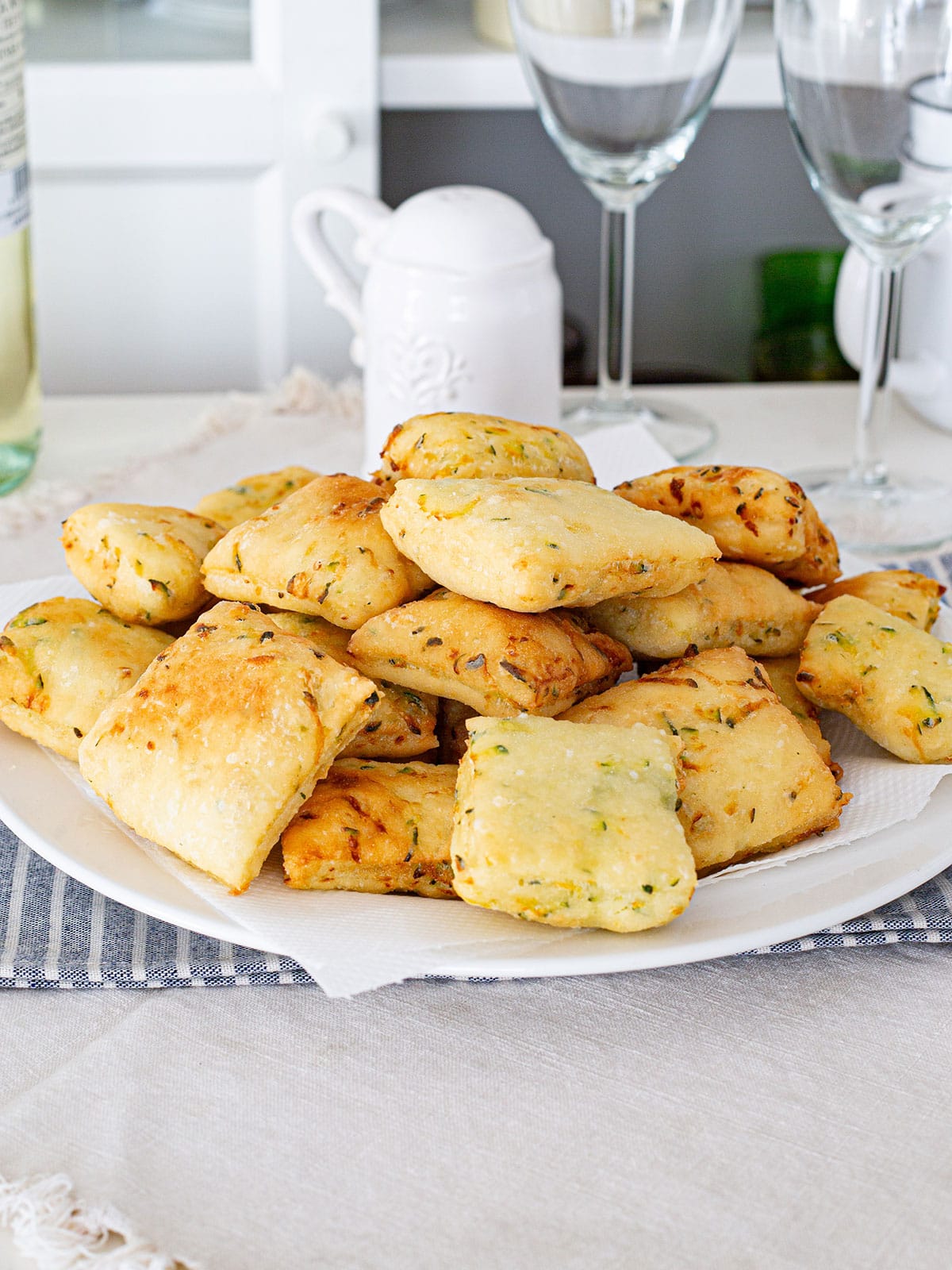 Zeppole di zucchine on a platter.