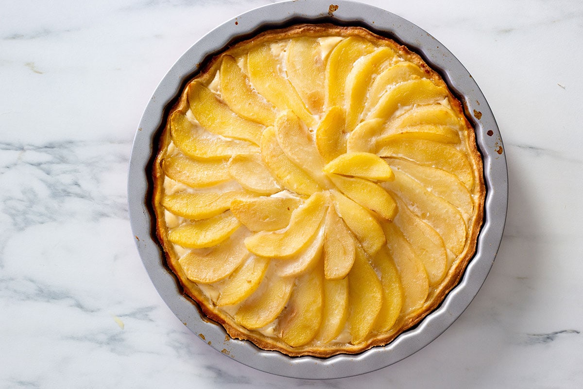 The ricotta and pear crostata baked, still on the pan.