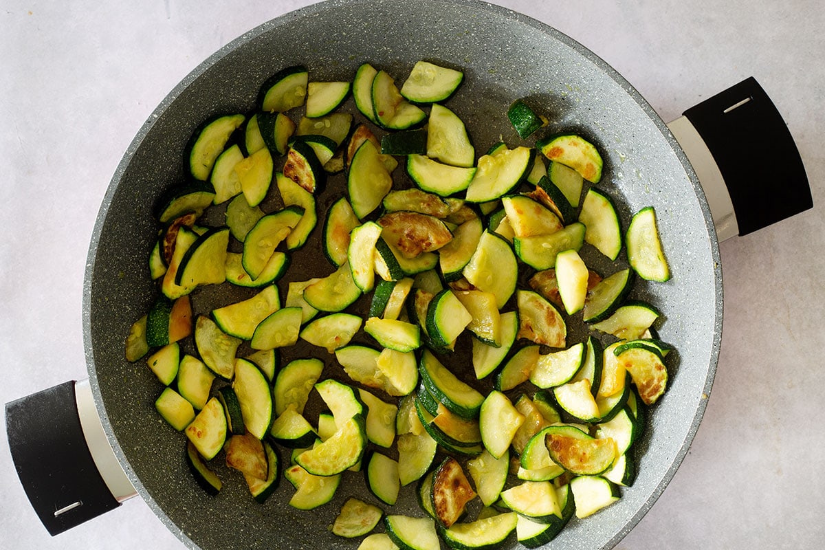 Cooked zucchini in a pan.