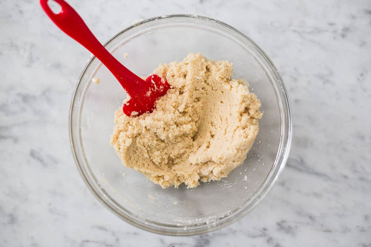 The amaretti cookie dough in a bowl.