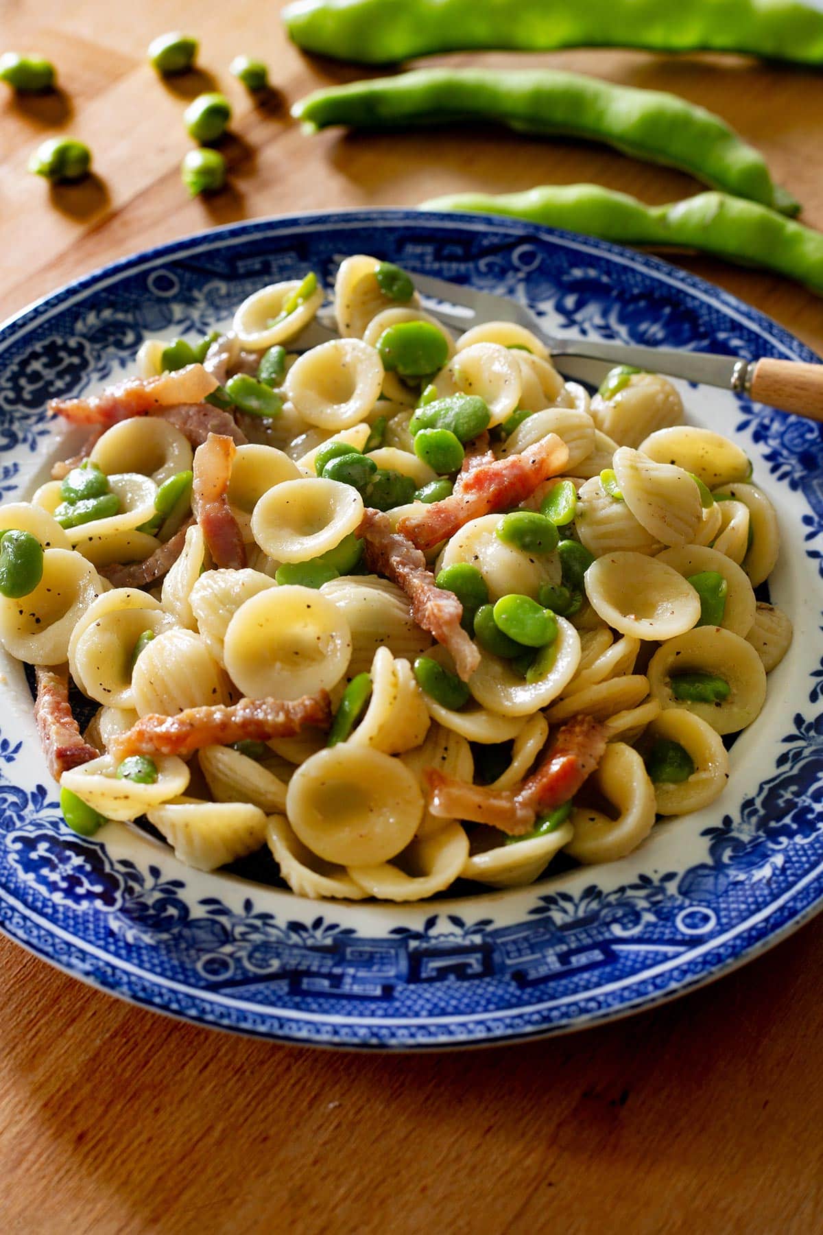 Pasta fave e guanciale in a plate.
