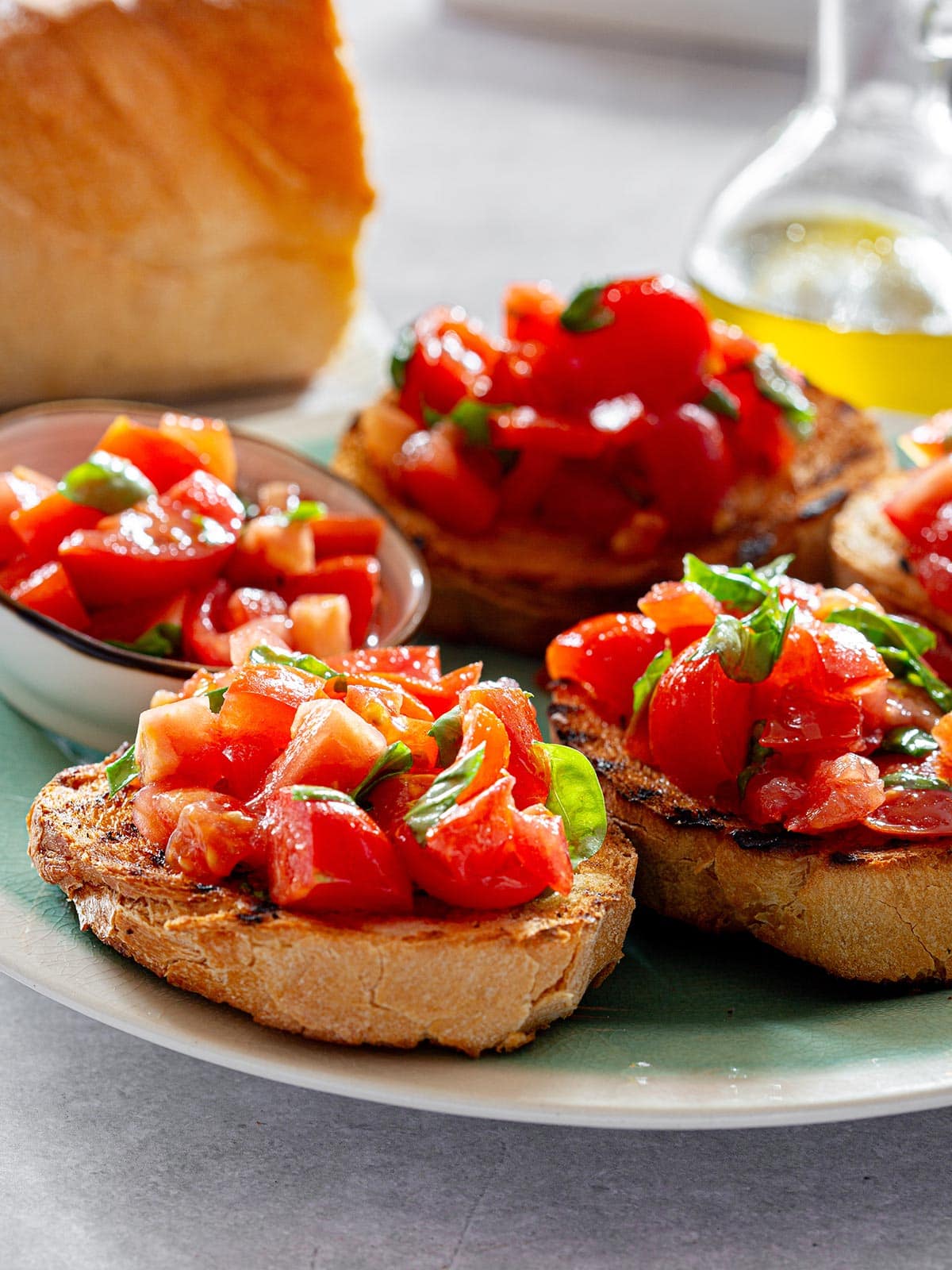 Bruschetta al pomodoro on a platter.