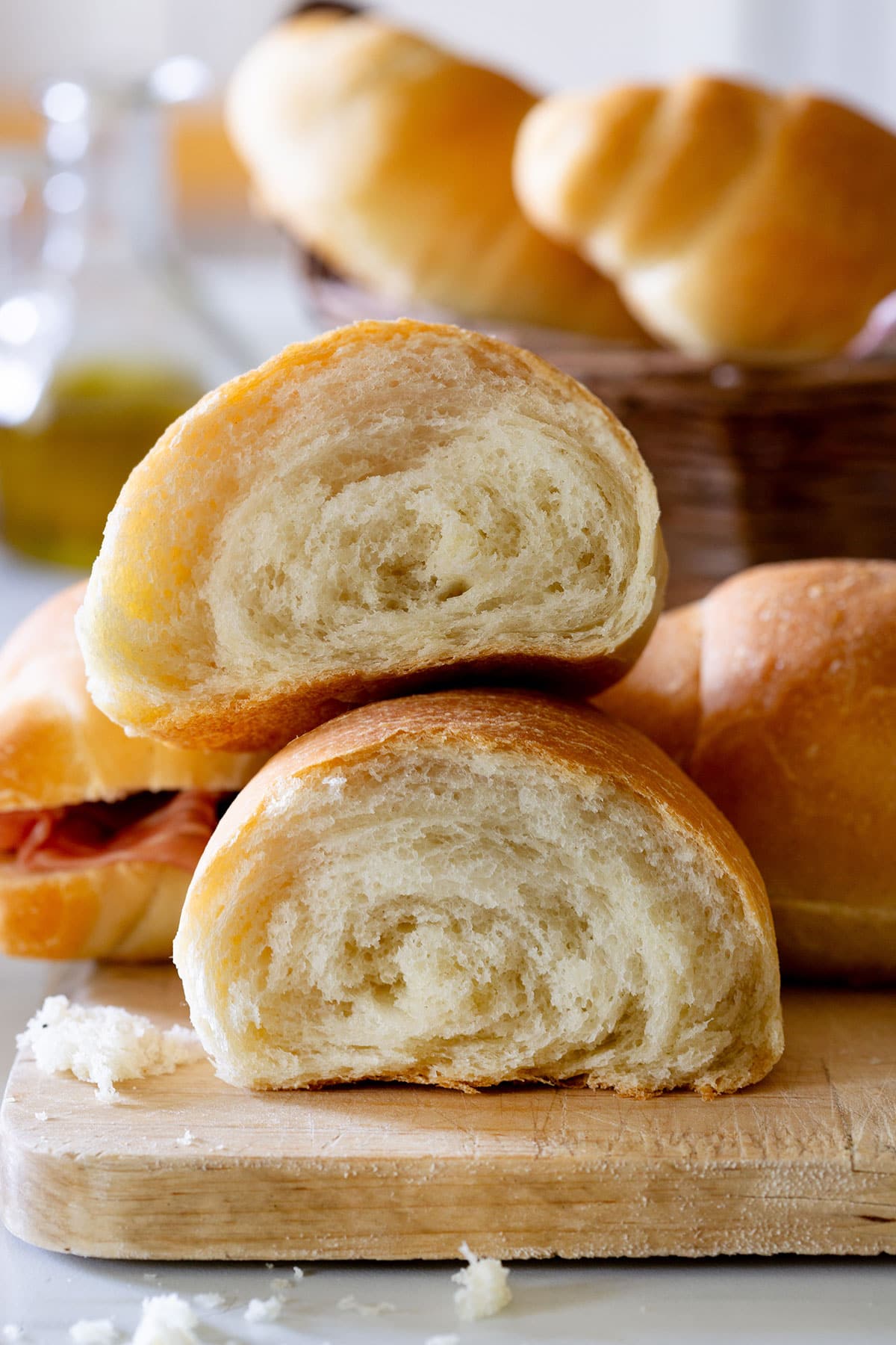 A panino roll opened showing its fluffy and soft crumb.