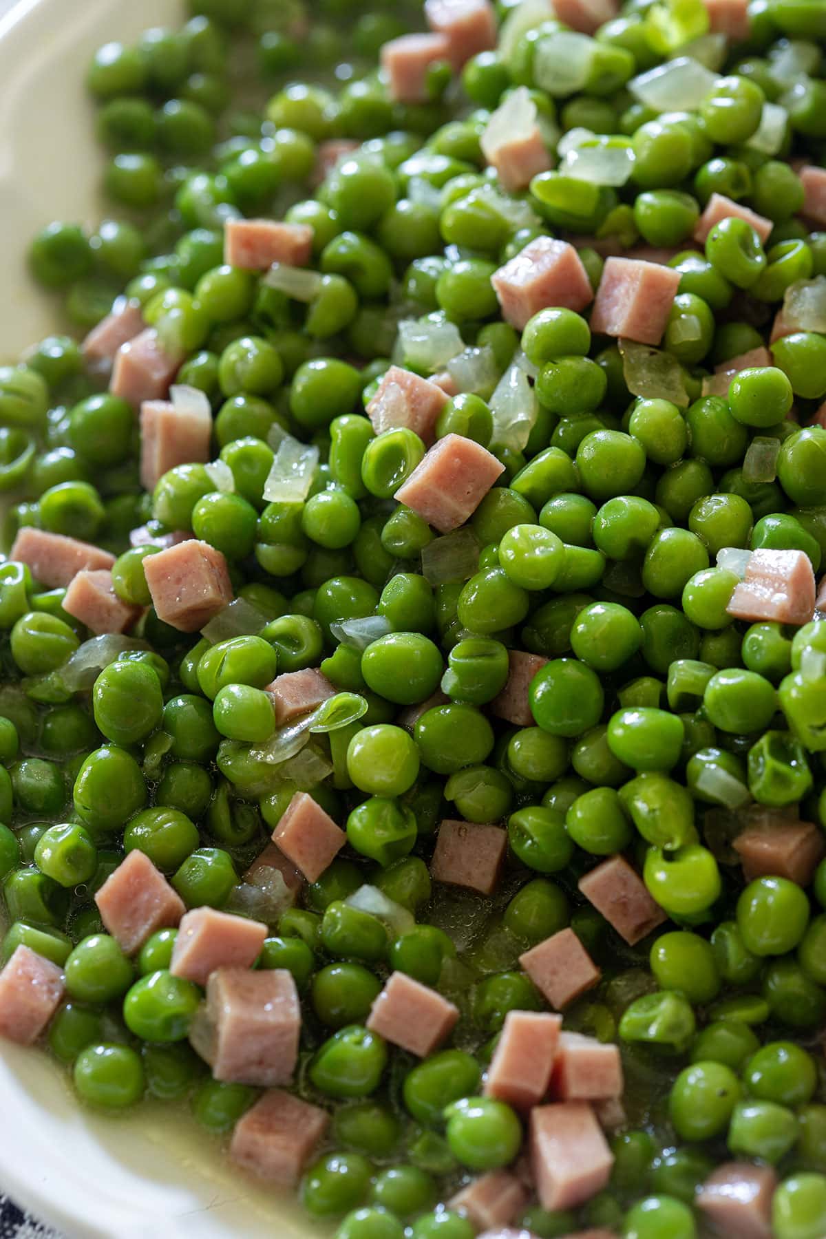 Close-up of piselli e prosciutto.