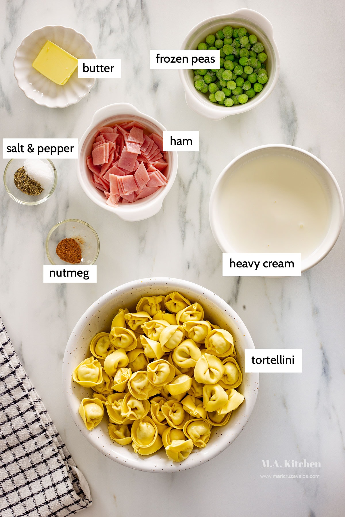 Ingredients for the tortellini and panna sauce recipe on a kitchen counter.