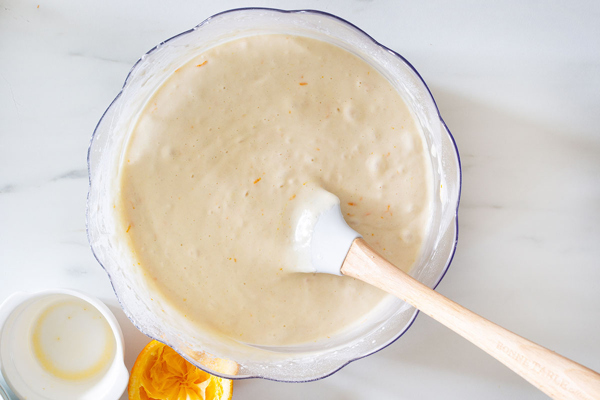 The final batter in a bowl with a spatula.